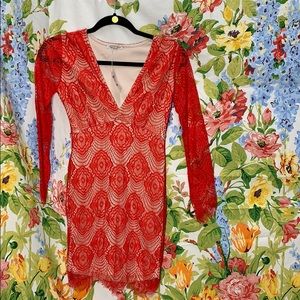 Charlotte Rouse Laced Mini Dress with lace sleeves